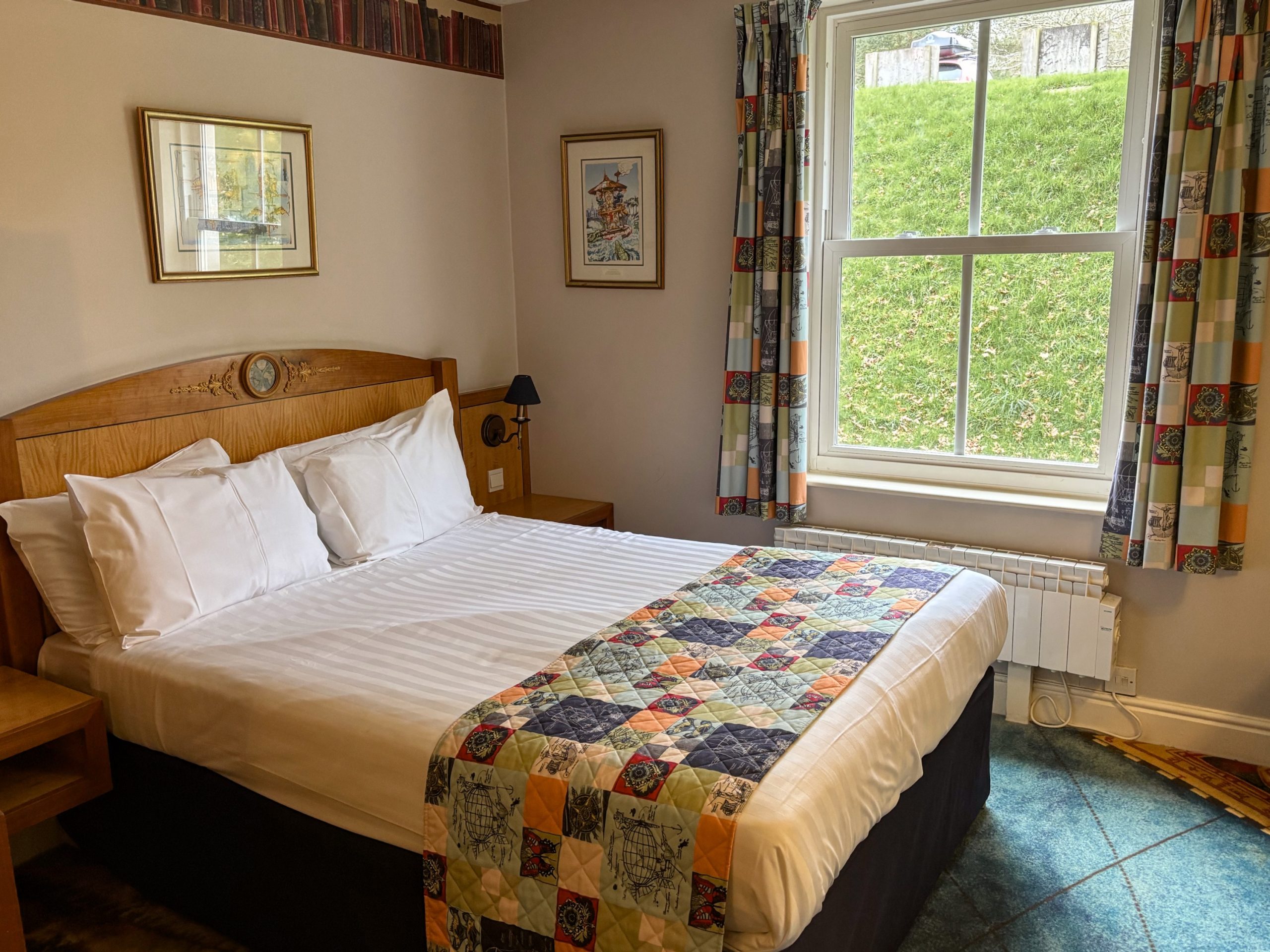 The main bed in a bedroom at The Alton Towers Hotel